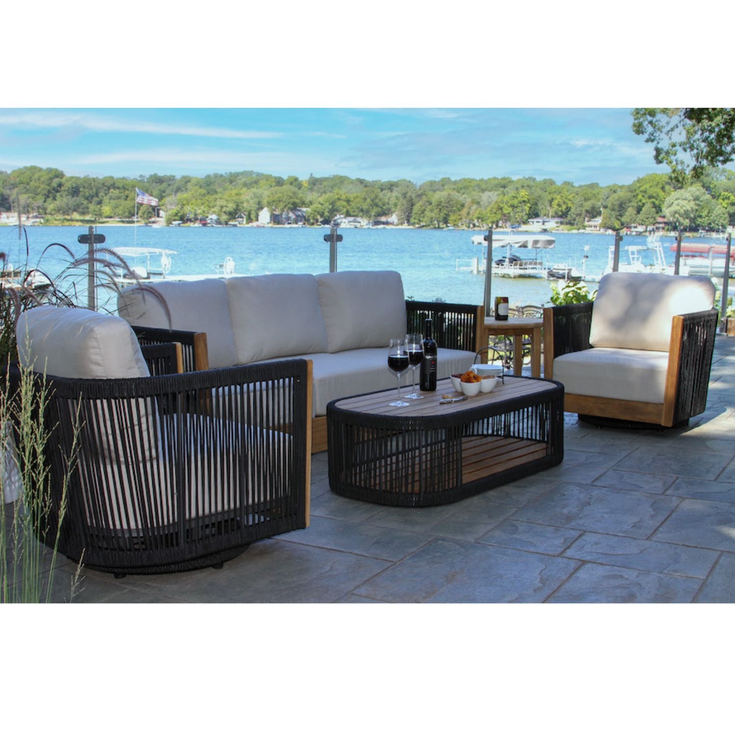 Teak Outdoor Patio set,by Outdoor Interiors. Sofa, swivel chairs, FSC, nautical rope, aluminum frame