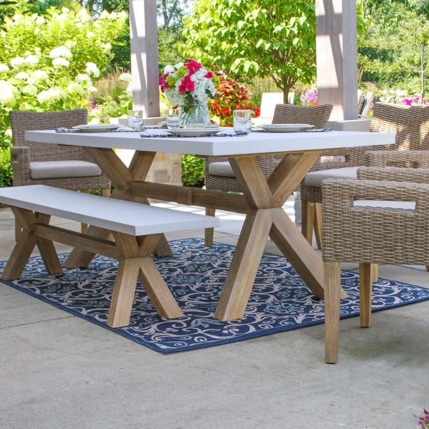 Outdoor Dining Set for 6, eucalyptus and poly resin concrete blend composite with bench seating. 
