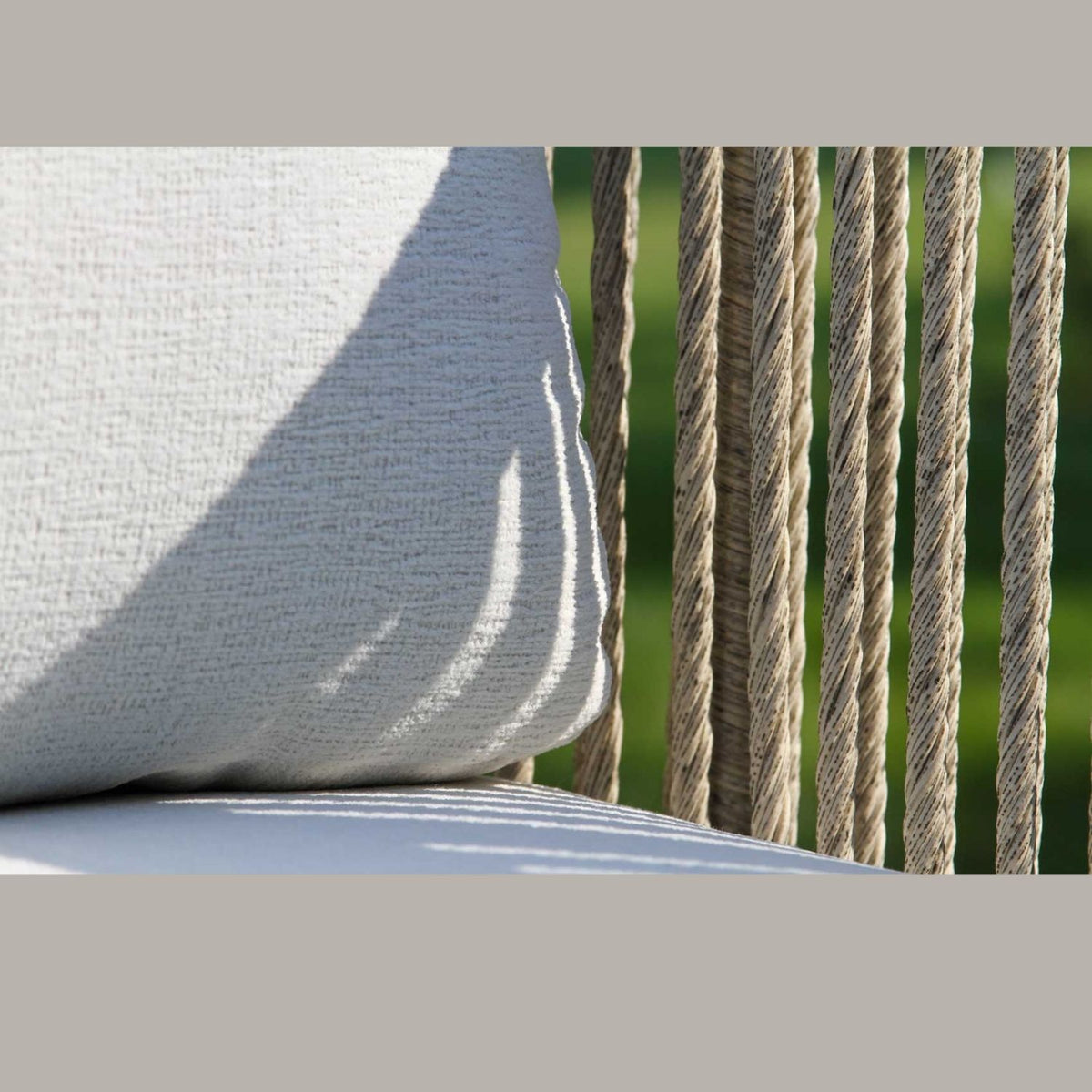 Detail of Outdoor Interiors Cabled Rope, Swivel Chair, certified teak hardwood, cable HDPE wicker