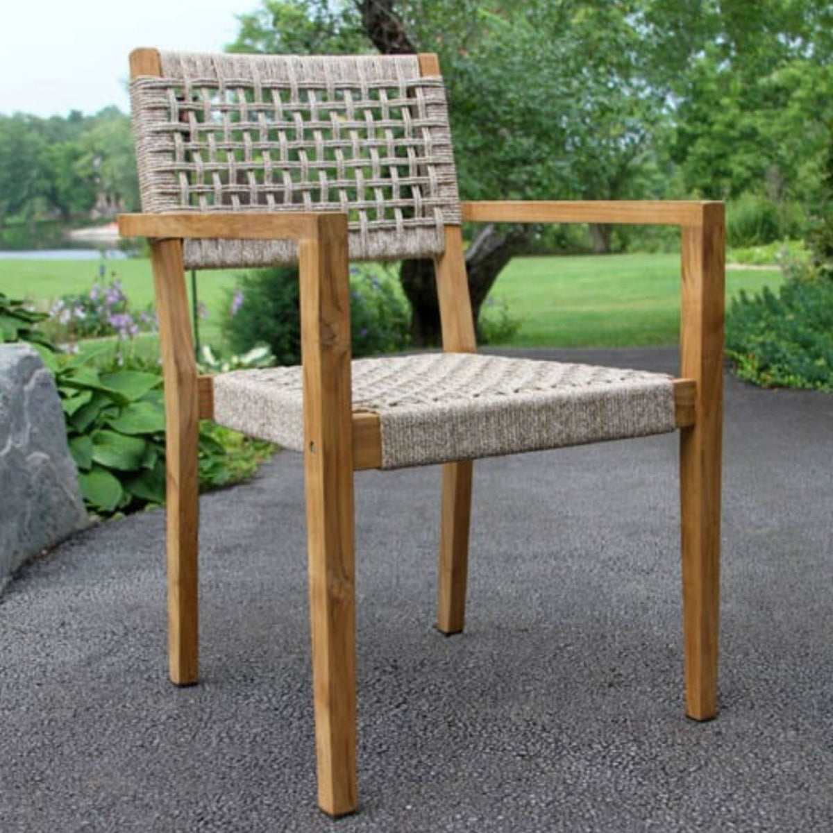 Nautical grade Rope and Teak Outdoor dining chairs in black or ash. Table top is a sintered stone