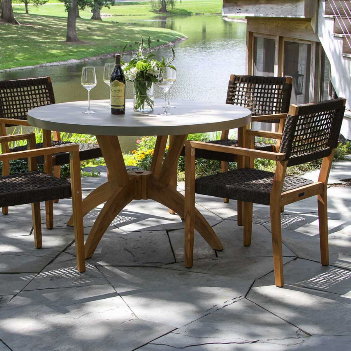 Nautical grade Rope and Teak Outdoor Dining Set,  Table top is a sintered stone, resistant