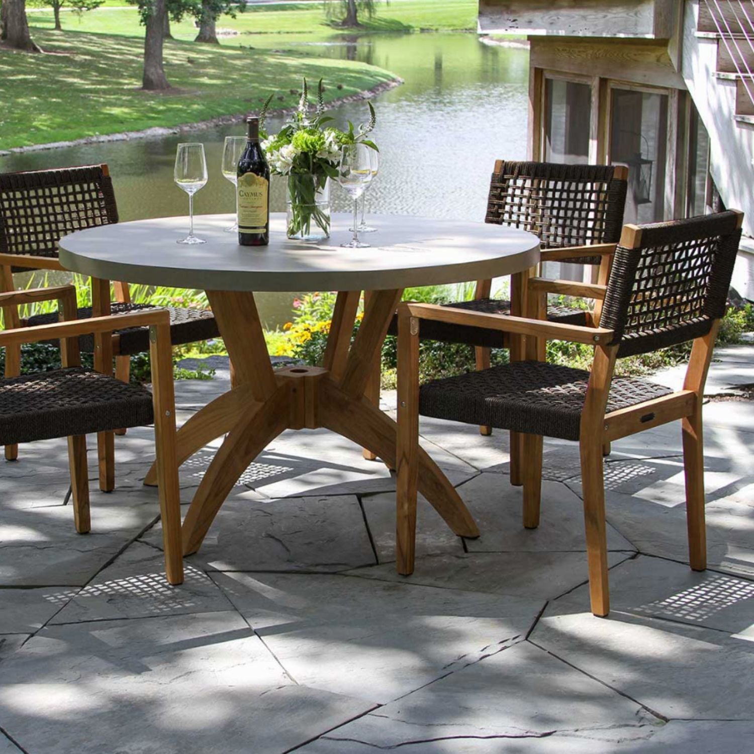 Nautical grade Rope and Teak Outdoor Dining Set,  Table top is a sintered stone, resistant