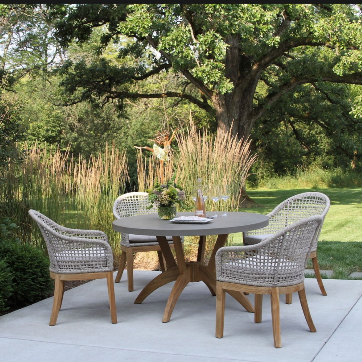 Nautical grade Rope- ash or black and Teak Outdoor Dining Set,  Table top is a sintered stone, 