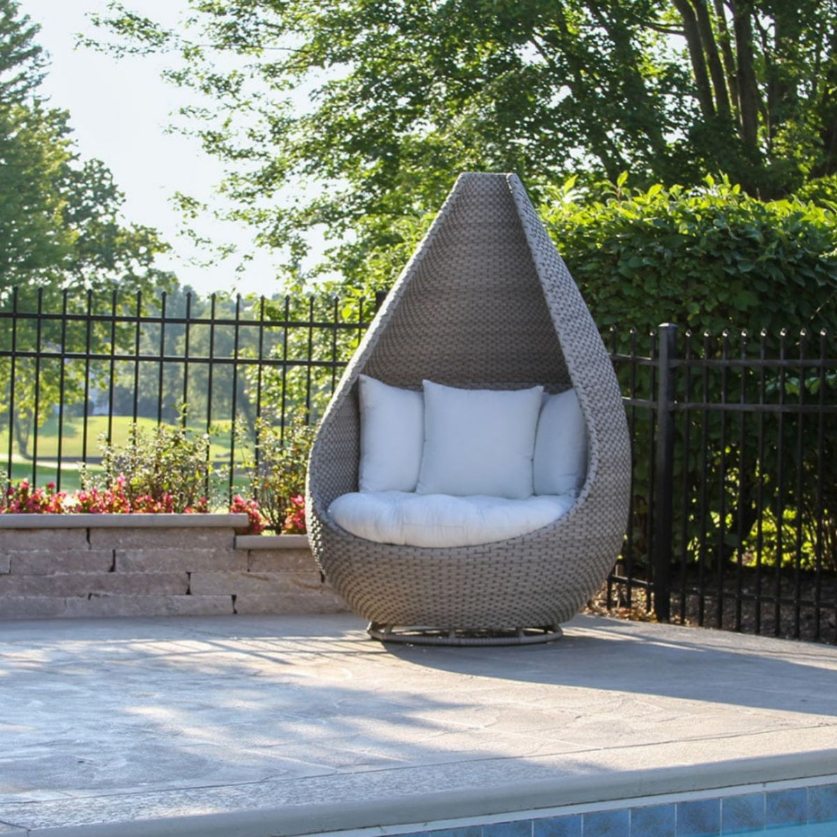 Oversized Swivel Outdoor Chair features smooth 360-degree swivel motion, plush seat cushion, pillows