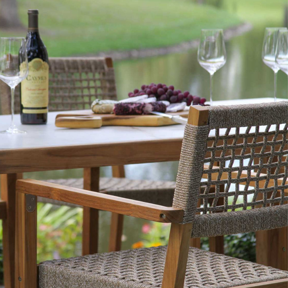 Outdoor dining set, nautical ash or black rope chair options and sintered stone table top