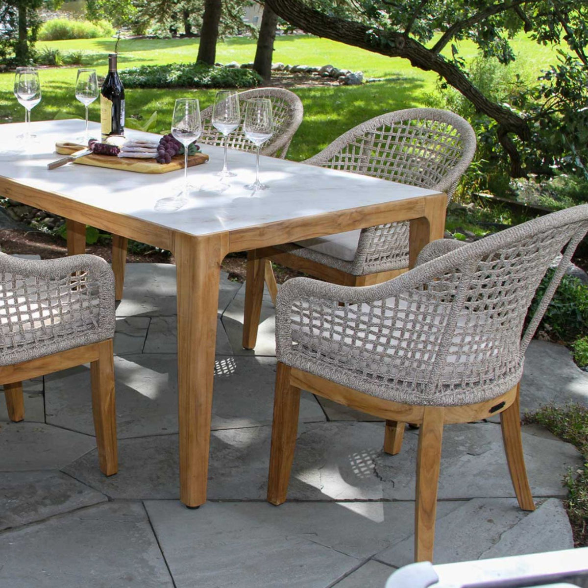 Outdoor dining set, nautical ash or black rope chair options and sintered stone table top