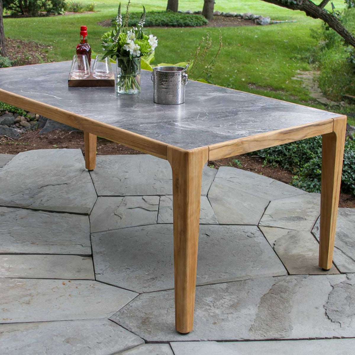 Outdoor dining set, nautical black rope chair options and sintered stone table top