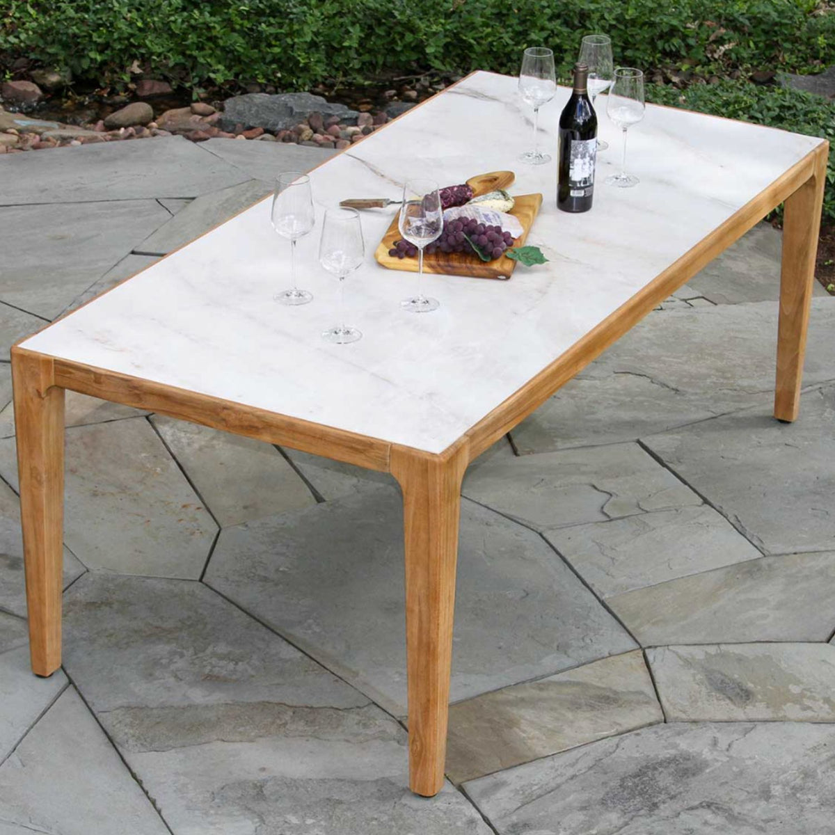 Outdoor dining set, nautical black rope chair options and sintered stone table top