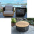 Black Rope and Teak swivel chairs, black lava coffee table